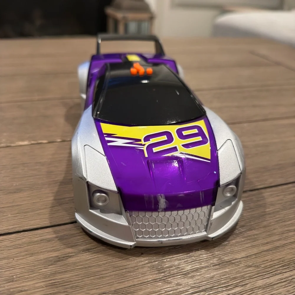 Vibrant Purple and Silver Toy Car
